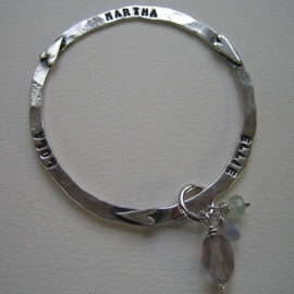 BC9 Flat hammered silver bangle with small hearts, customised hand stamped message and semi-precious stones